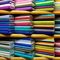 shopping-style-fabric-stores-rolls-of-fabric