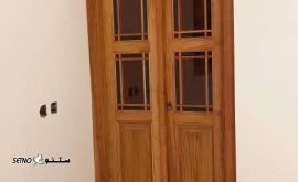 قیمت خرید درب ورودی چوبی شیشه خور طرح خورشیدی با چوب روسی و شیشه هندی