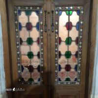 ساخت درب منزل با چوب گردو طرح اسلیمی در اصفهان